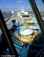 ID 2905 EXPLORER OF THE SEAS (2000/137308grt/IMO 9161728) - The midship Deck 11 main pool area featuring two swimming pools, four whirlpools and The Pool Bar. Seen from the Crows nest observation area, part...